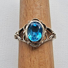 925 STERLING SILVER OVAL 9x7 mm. BLUE TOPAZ FLOWER RING SIZE 5.5