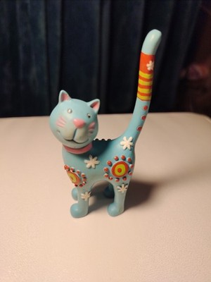 Blue Cat Figurine With Long Tail Pink Collar And A Smile.