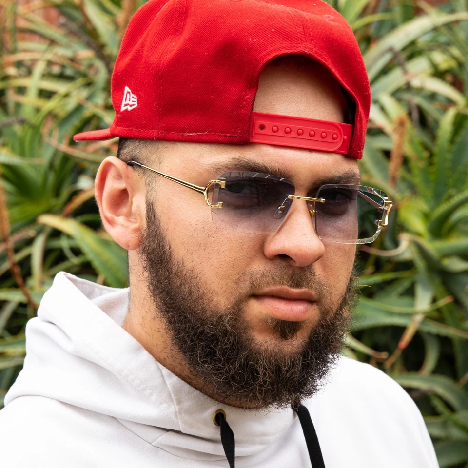 Gafas de sol rectangulares de lujo sin montura hip hop marco dorado tinte azul corte gema para hombre Foto 4 de 4