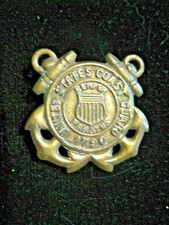 VINTAGE  U S COAST GUARD  HAT BADGE. BRASS. 1 1/4".