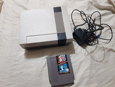 Nintendo entertainment system console  nese-001, power cable, mario bros/duck hu