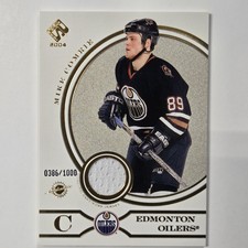 2003-04 Pacific Private Stock Reserve - Mike Comrie #167 /1000 Game Used