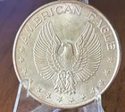 VINTAGE AMERICAN EAGLE .999 FINE SILVER ART ROUND - ONE TROY OUNCE
