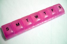 Pink Plastic 7 Day Pill Box Container Organizer - Tight Snapping Sections