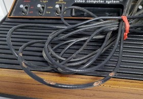 D-460 VINTAGE ATARI 2600 VIDEO COMPUTER SYSTEM BUNDLE-CONTROLLERS, JOYSTICKS, +!