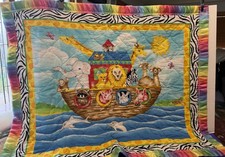 Baby comforter Noah  s ark with neon border gently used 33/42  Homemade