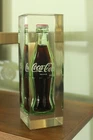 6.5 fluid oz coke bottle encased in lucite vintage