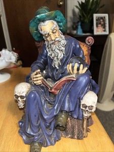 SUMMIT COLLECTION 1998 WIZARD IN A CHAIR  WITH CRYSTAL BALL. 8.5” TALL.