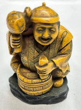 Netsuke Sitting Buddha Hammering A Barrel, 2.5" Ivory Resin Figurine, Home Decor