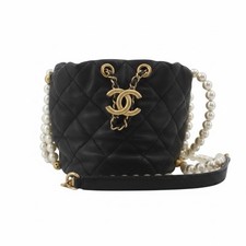 CHANEL CC Pearl Drawstring Bucket Bag Black Lambskin Aged Gold Hardware