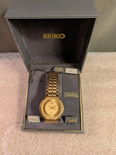 NIB VINTAGE GOLD TONED SEIKO MENS WATCH V701-6K00 NEW BATTERY
