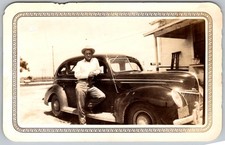 Vtg B&W Snapshot Man in Hat Leaning On 1939 Ford Deluxe Sedan Car 1939