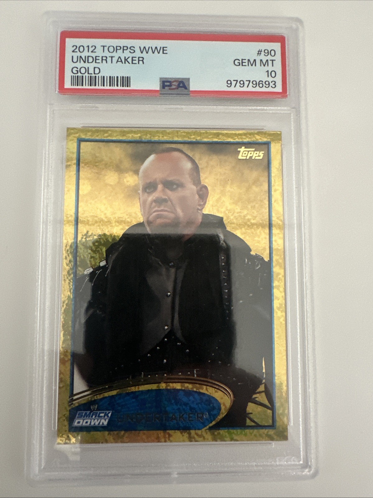 #90 Undertaker 2012 Topps WWE sports Gold PSA 10. Low Pop view 1