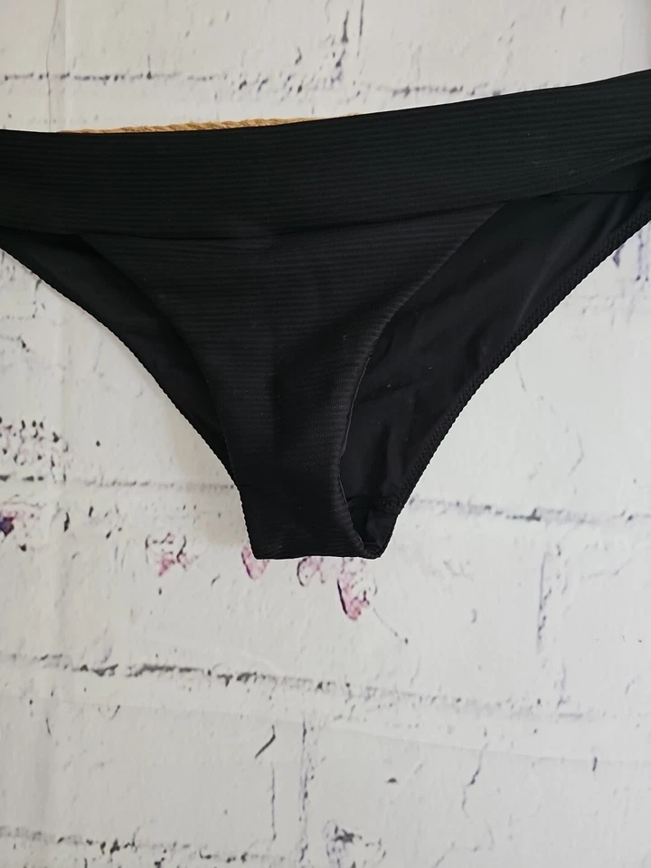 Parte inferior de bikini hipster de punto elástico acanalado negro talla 10 totalmente forrada de H&M Foto 2 de 4