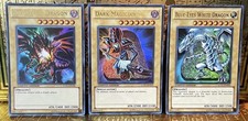 Blue-Eyes White Dragon, Dark Magician and Red Eyes B Dragon LC01