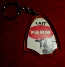 Porte-clés LAIT FARM en boite de conserve -- pauvre vache !!