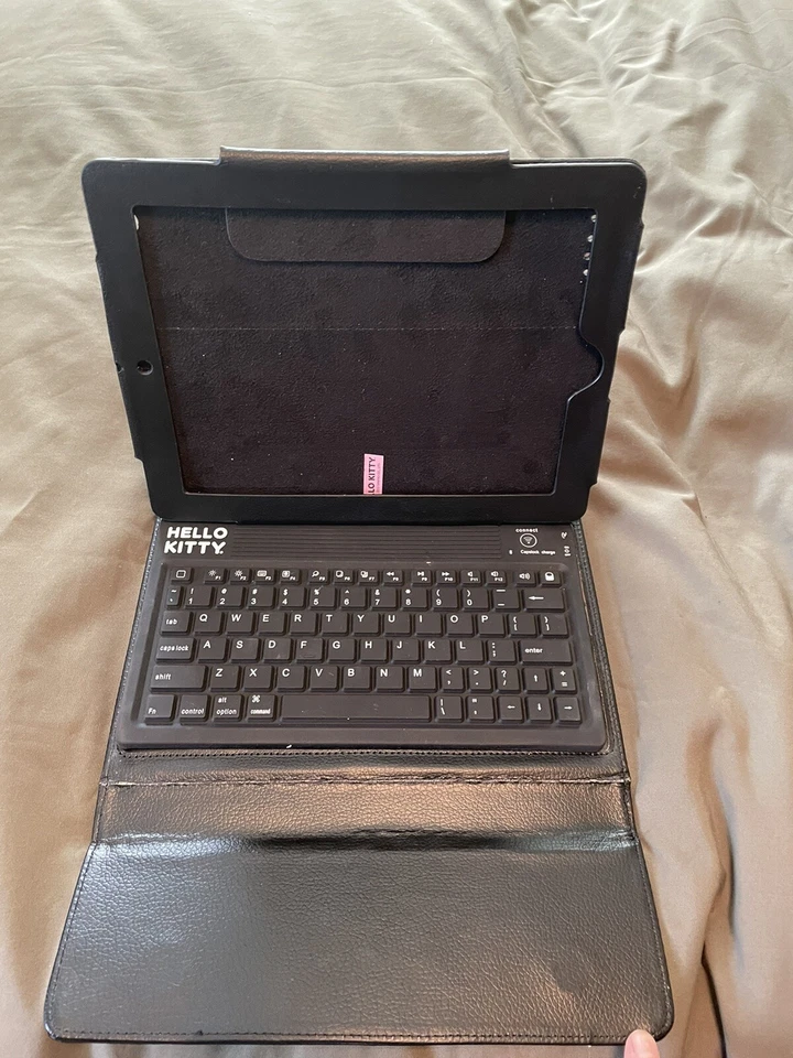 Funda portafolio de cuero Hello Kitty para iPad 2/3 con teclado inalámbrico, soporte para lápices Foto 2 de 4