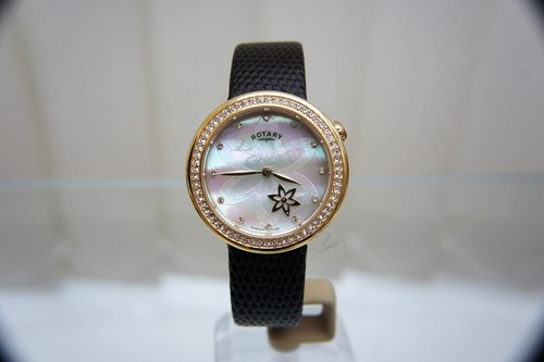 NUEVO Reloj giratorio para damas esfera madreperla correa de cuero marrón PVP £180 EN CAJA - Imagen 6 de 12