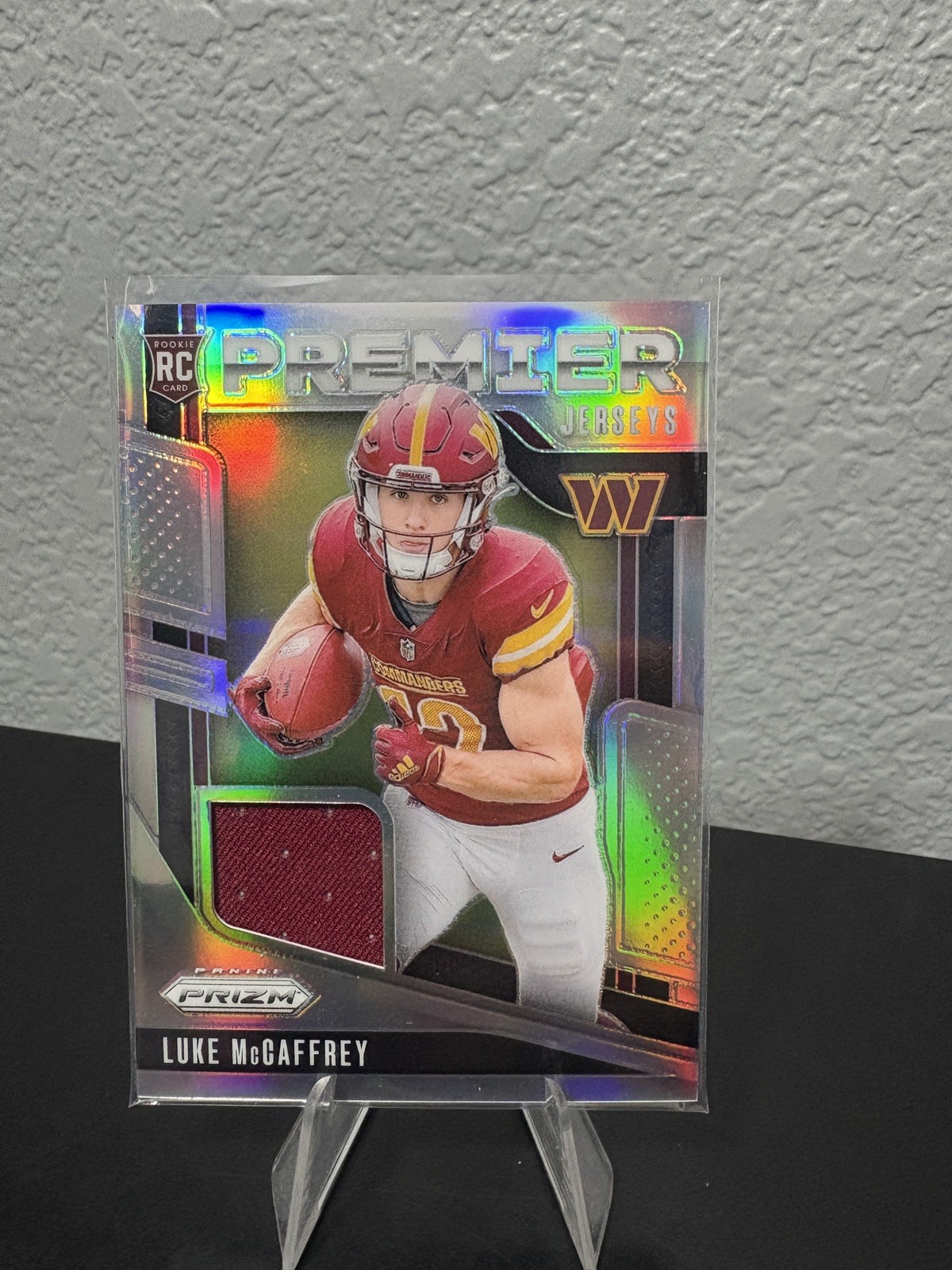 Luke McCaffrey 2024 Prizm Prizm Rookie RC - SILVER HOLO PREMIER JERSEYS #PJ-LMY