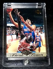 GRANT HILL RC 1995 UD FIRST TEAM ROOKIE CARD - GOLD FOIL - PISTONS, HOF. rookie card picture