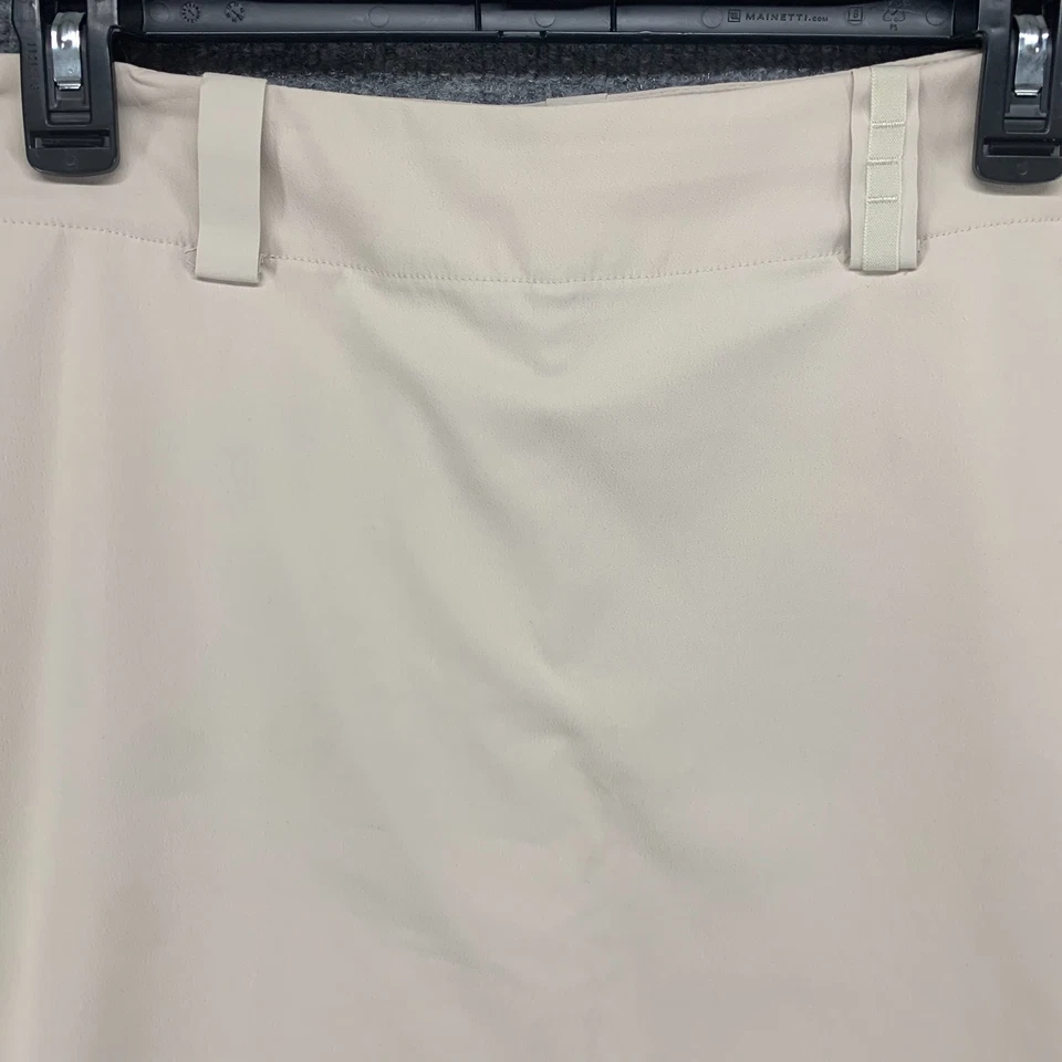 Falda corta de golf NIke para mujer 14 beige Dri Fit elástica rendimiento activo 34 Foto 3 de 4