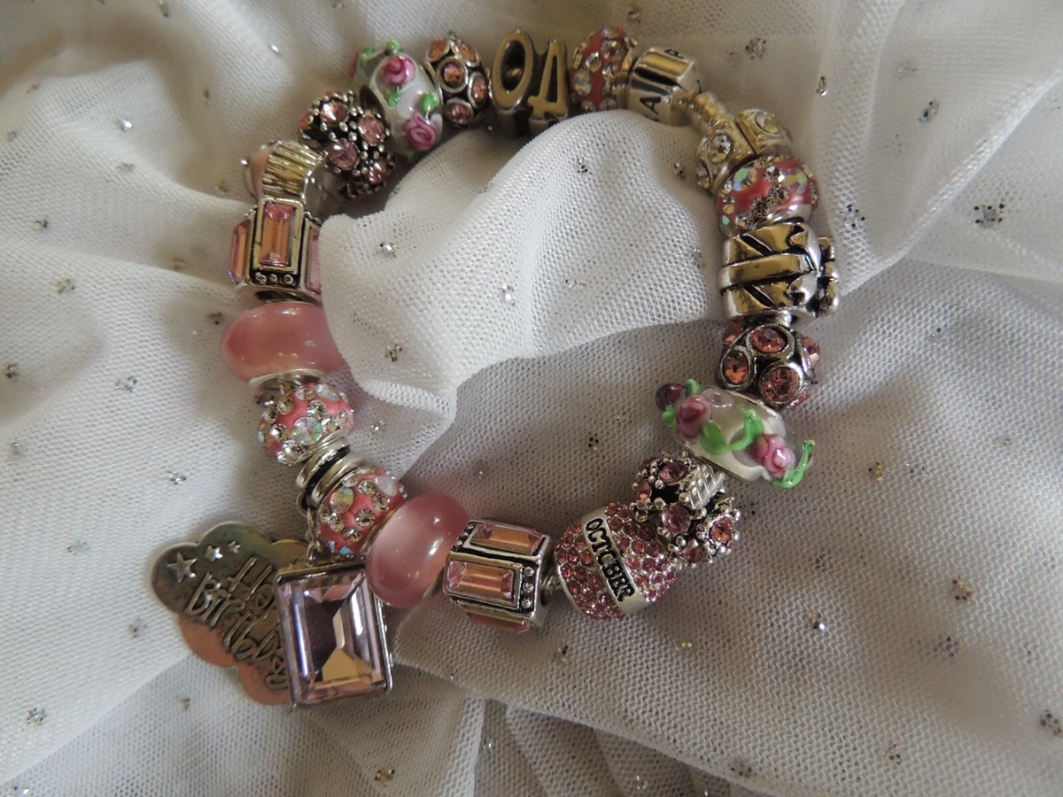 Pandora Bracelet With Pink Blue and Black Themed Charms 