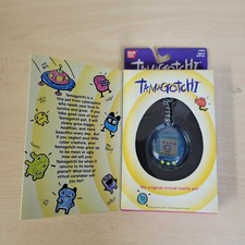 NEW VINTAGE 1997 BANDAI TAMAGOTCHI VIRTUAL PET TRANSLUCENT SKELETON BLUE CLEAR