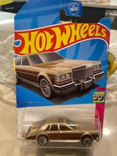 2023 Hot Wheels #75 HW: The '80s 7/10 '82 CADILLAC SEVILLE Gold w/Chrome Lace Sp