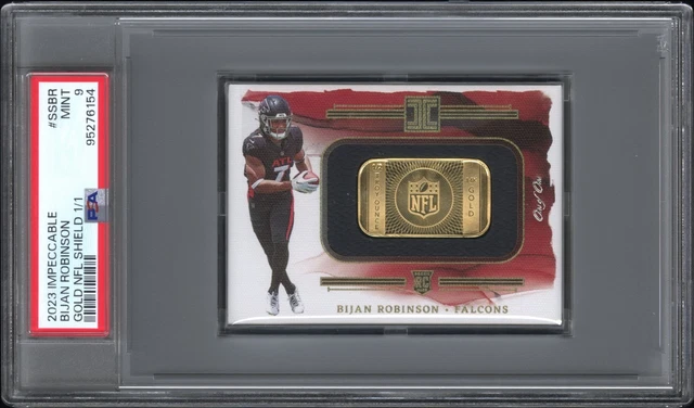 🔥 2023 IMPECCABLE BIJAN ROBINSON GOLD NFL SHIELD 1/1 BAR 14K ROOKIE MINT PSA 9