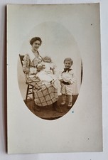 VTG 1910 RPPC YOUNG MOTHER IN WILD PLAID DRESS TWO KIDS BABY HANDSOME YOUNG CHAP