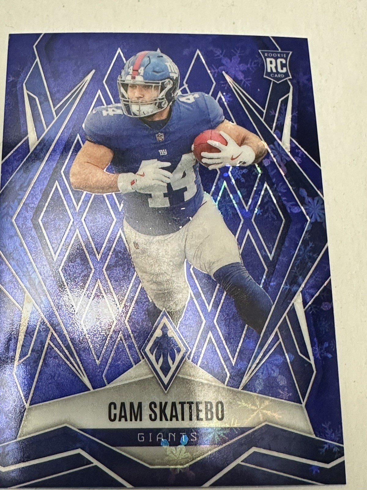2025 Panini Phoenix Holiday #168 Cam Skattebo Winter Blue #/199