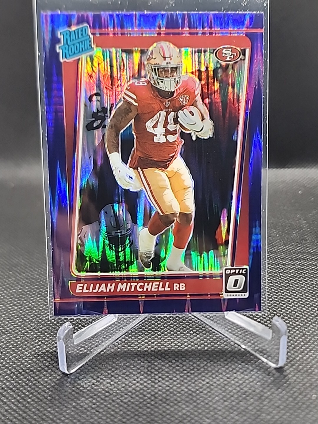 2021 Panini Donruss Optic - Rated Rookie Purple Shock Prizm #291 Elijah Mitchell