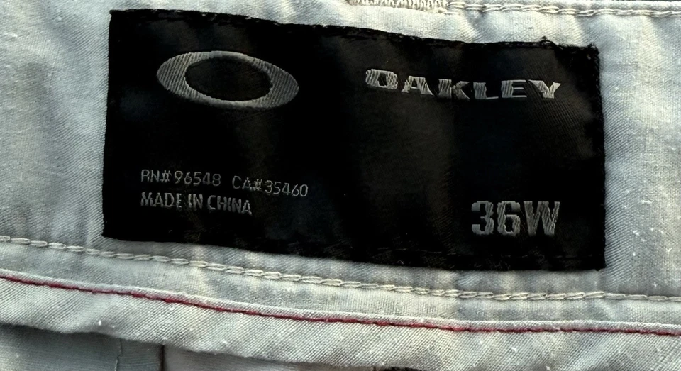 Pantalones cortos chinos Oakley para hombre talla 36 crema Foto 2 de 3