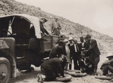 #37805 Possibly Italian Libya 1920s. Repairing the wheel of the car. Photo