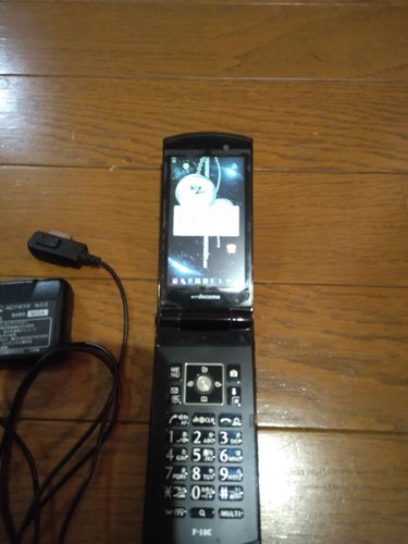 NTT Docomo F-10C Folding Mobile Phone With Charging Cord Japanese Flip Phone Gar - Picture 5 of 7