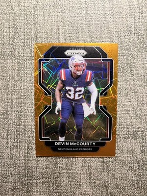 2021 Panini Prizm Devin McCourty No. 100 Orange Lazer - New England Patriots