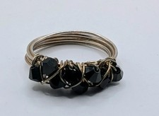 handmade wire-wrapped ring with black beads
