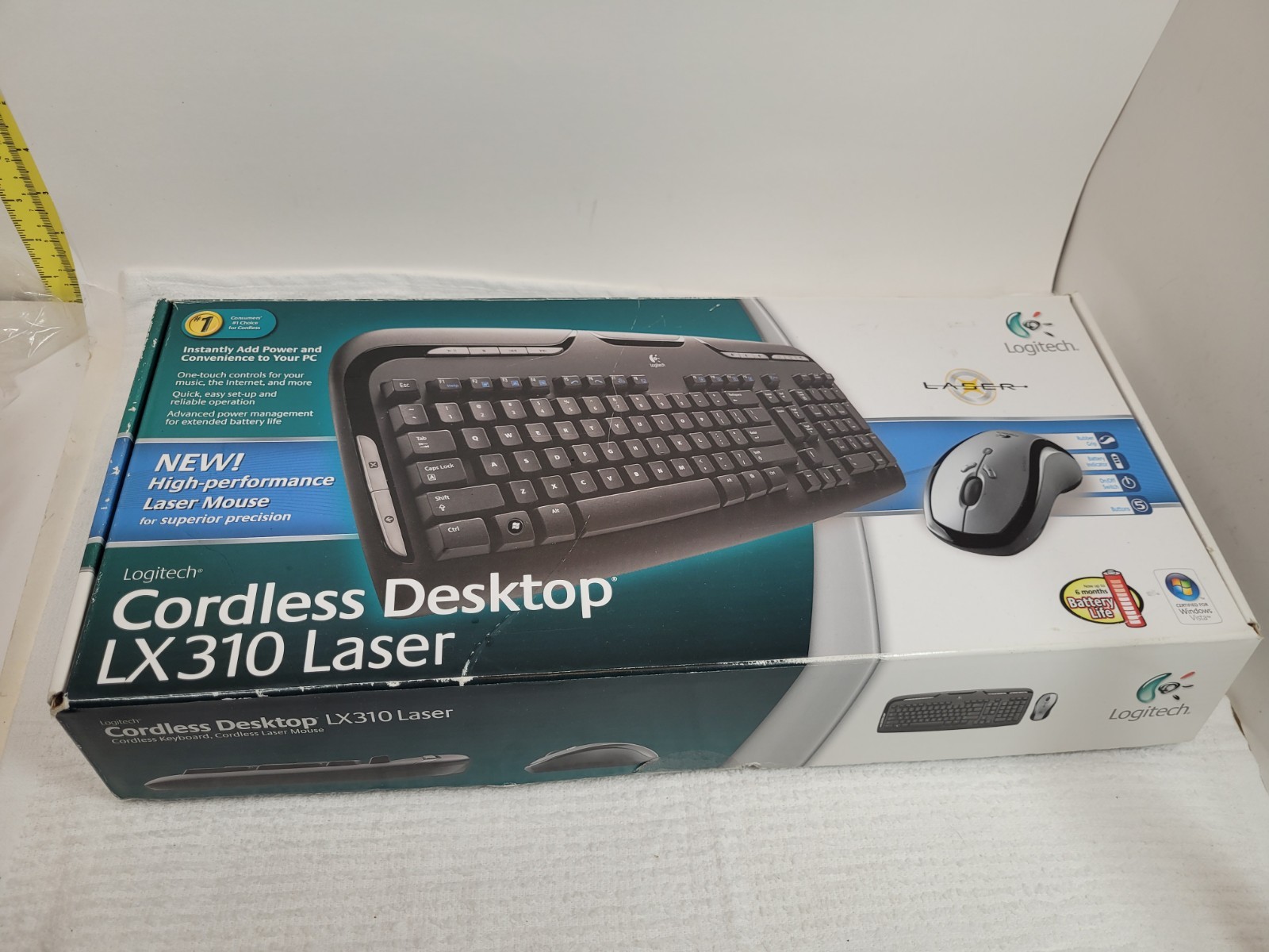 Logitech Desktop Multimedia Hot Key Wireless Keyboard and Laser Mouse Kit LX310