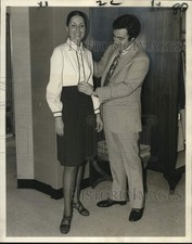 1970 Press Photo Rodriguez shows a brown matte jersey and cream polyester dress