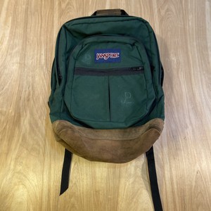 green jansport backpack leather bottom