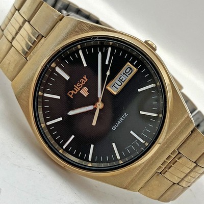Vintage Pulsar by Seiko Classic Day Date Watch Y563-8179 Gold