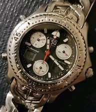 Movado ESQ Swiss Panda Dial Analog Digital Chrono Alarm Tag Influences& $erviced