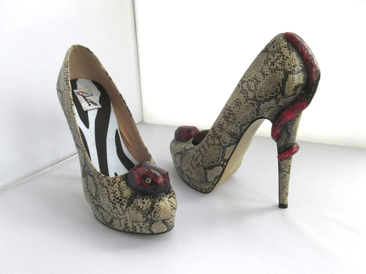 Shoes with snake wrapped around deals heel