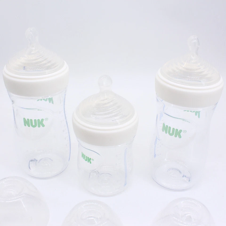 Lote de 3 biberones NUK Simply Natural (dos 9 oz blancos y uno 5 oz blanco) Foto 2 de 4