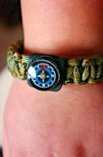  new Paracord survival compass bracelet. 8 inches long. good for starting fire. 