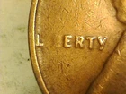 1942 COPPER LINCOLN WHEAT PENNY MINT ERROR L--ERTY