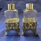 Pair Vintage Perfume Bottles Gold Brass Tone Mal Filigree look Over Glass Footed