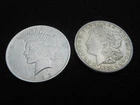 Junk  1921 Morgan and 1922  Peace  silver dollars   g/vg   (free shipping)