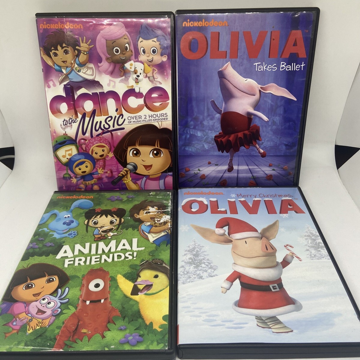Lot of 4 Kid's DVDs - Olivia, Animal Friends, Dora, Go Diego