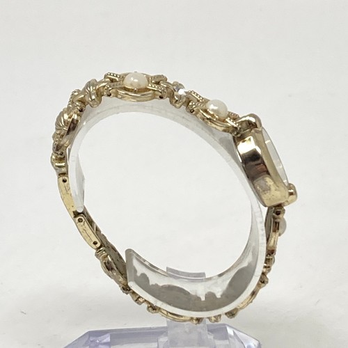 Reloj de perlas sintéticas para mujer 22 mm tono dorado esfera mop batería nueva 6,75" - Imagen 8 de 21
